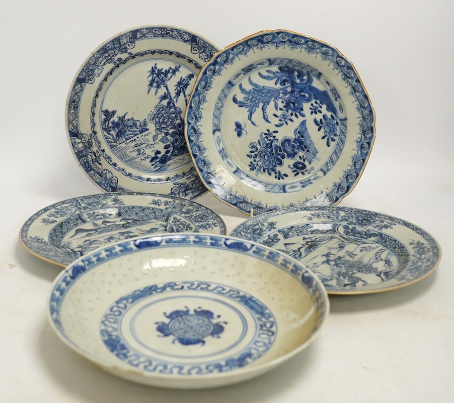 Four Chinese blue and white export plates and a rice bowl, bowl 24.5cm diameter. Condition - poor to fair, some damage to the edges